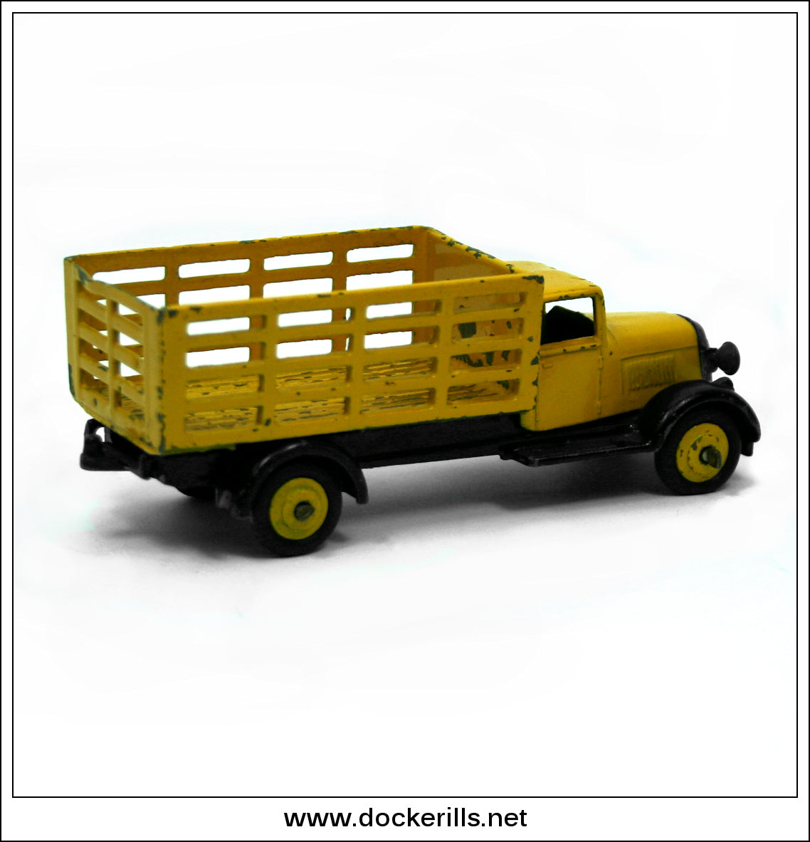 A Dinky Toys 25B/4 grey Covered Wagon with red hubs A Dinky Toys 25B/4 grey Covered Wagon with red hubs