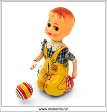 Bouncing Dolly Ball. Vintage Tin Plate Clockwork Novelty Toy, T.P.S. Toplay Ltd., Japan.