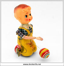 Bouncing Dolly Ball. Vintage Tin Plate Clockwork Novelty Toy, T.P.S. Toplay Ltd., Japan.