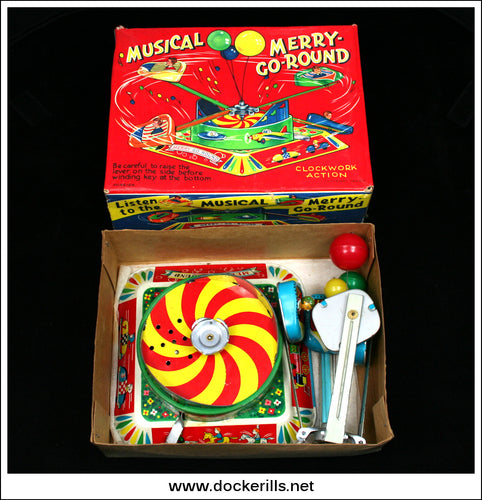Musical Merry-Go-Round. Vintage Tin Plate Clockwork Novelty Toy, Alps, Japan - Toy and Box.