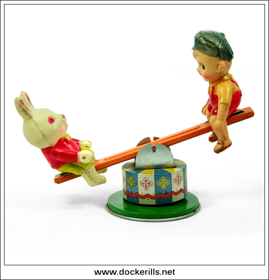 See Saw Rabbit And Boy. Clockwork / Wind-Up Novelty Toy, Fuji Press Kogyo, Japan.