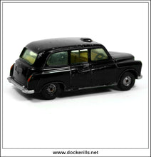 Corgi Austin London Taxi. FOR RESTORATION.