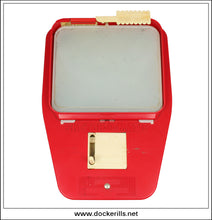 Vintage Merit Sketch-O-Matic drawing toy in red.