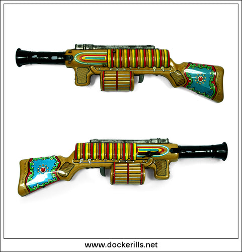 Universal Gun. Vintage 1950's Tin Plate Sparking Space Gun, Nomura, Japan 1.