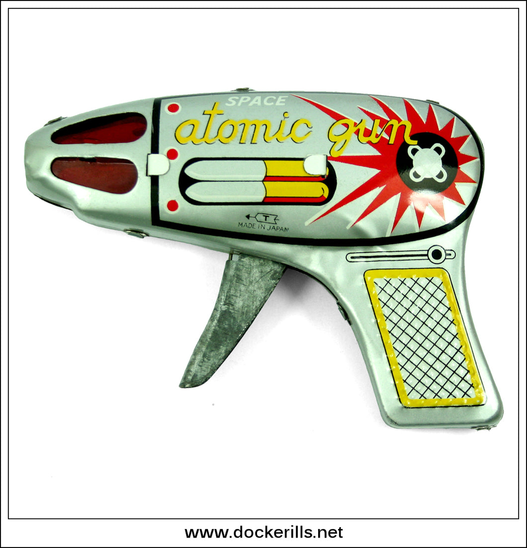 Space Atomic Gun. Vintage Tin Plate Toy Space Ray Gun, T-Arrow, Japan.