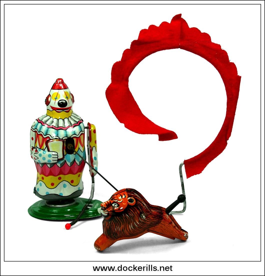 Clown Making The Lion Jump Thru The Flaming Hoop. Vintage