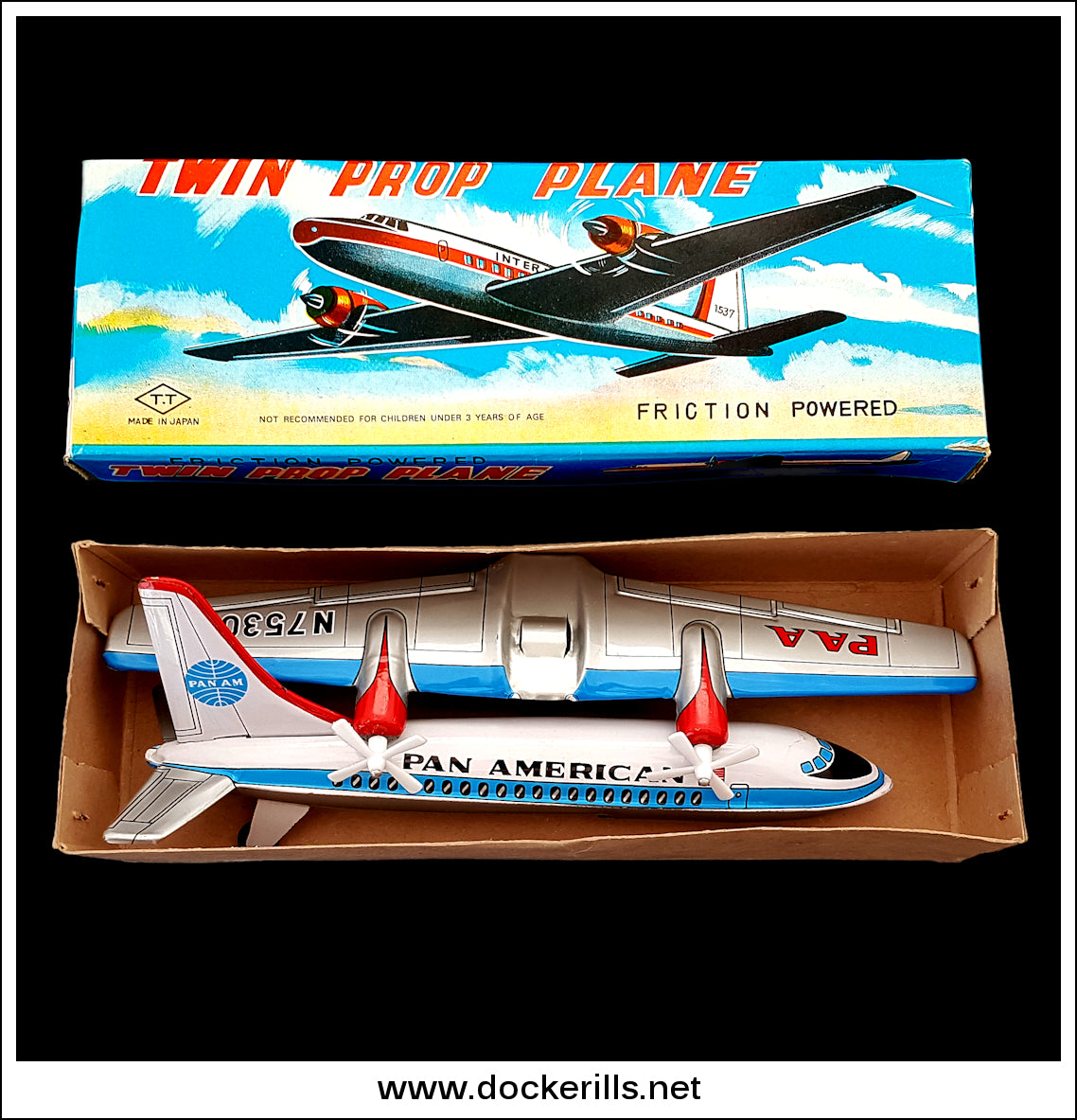 Twin Prop Plane. Vintage Friction Drive Tin Plate Toy Twin Prop Plane. Vintage Friction Drive Tin Plate Toy
